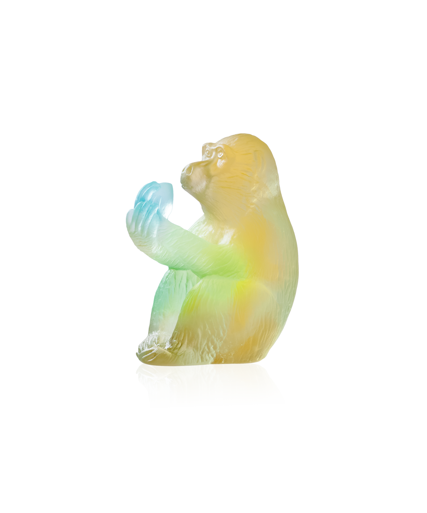 Singe à la pêche horoscope en cristal de Daum, sculpture artistique représentant un singe avec une pêche, détails fins et élégants.