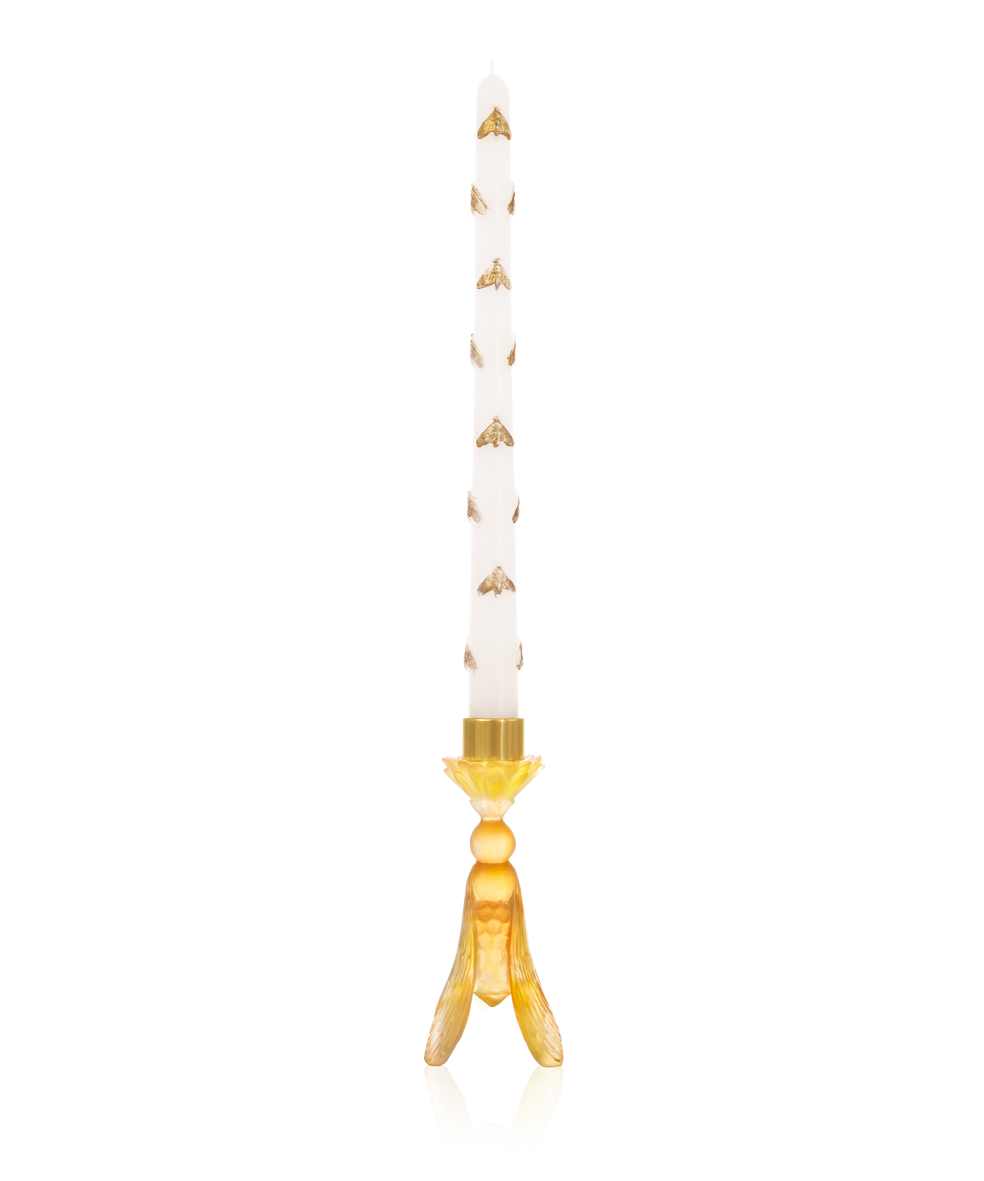 Bougeoir en or d'abeille de la marque Daum Intérieur avec chandelle blanche dans un design élégant et raffiné.