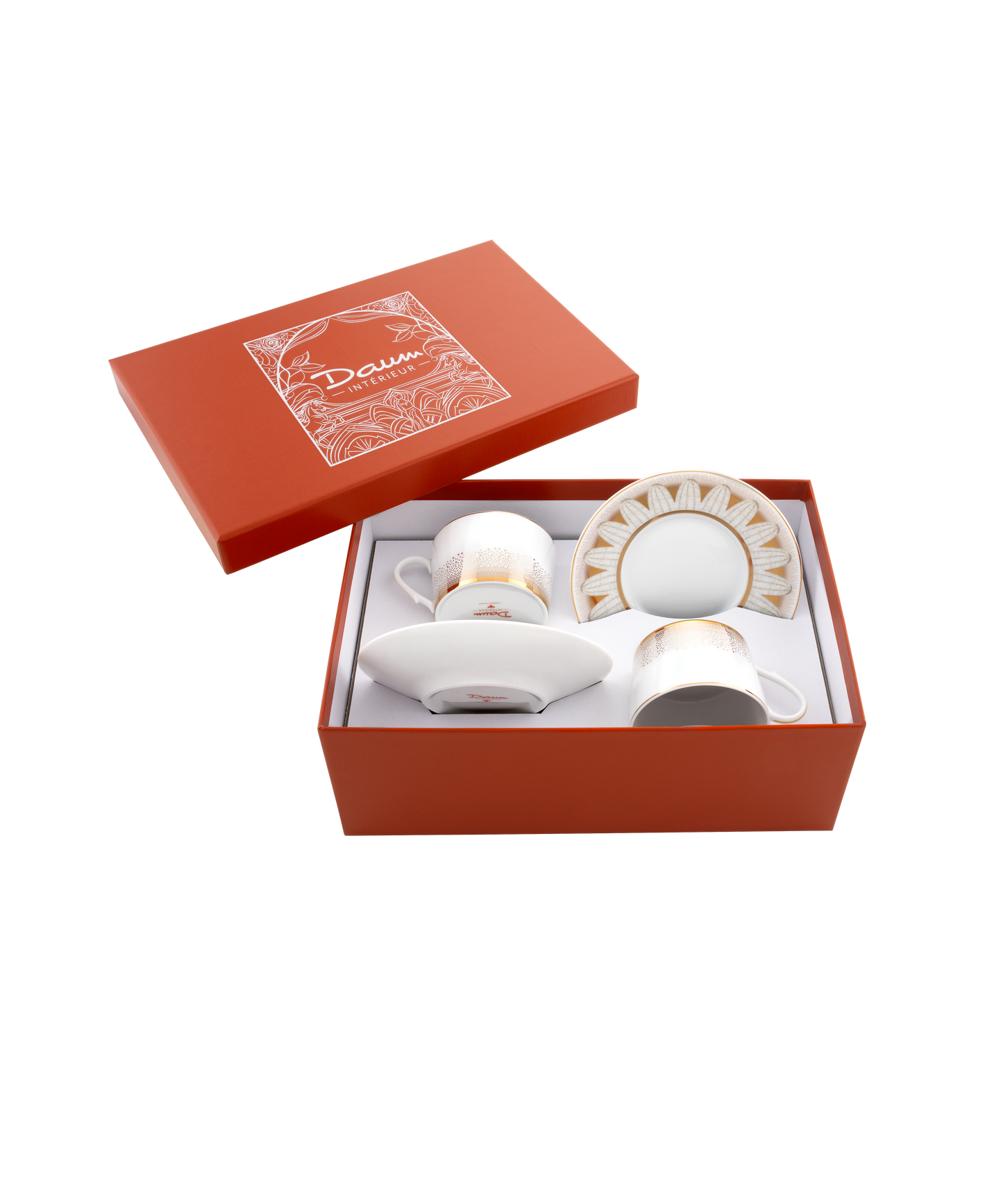Deux tasses à thé en porcelaine Daum Intérieur avec soucoupes dans un coffret Or d'Abeille, élégantes et délicates.