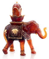 Sculpture d'éléphant en verre Daum Shalmara 25ex, détail brillant et coloré, sur fond neutre.
