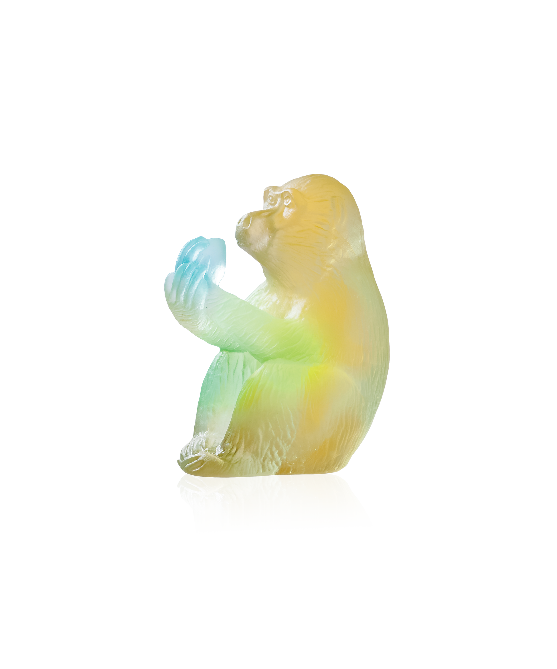 Singe à la pêche horoscope en cristal de Daum, sculpture artistique représentant un singe avec une pêche, détails fins et élégants.